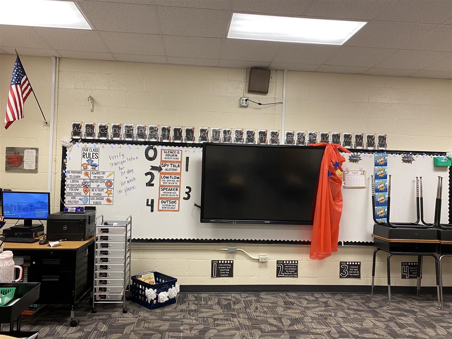 front of desk  